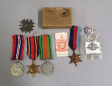 World War II four medal group, including The Burma Star, together with Third Reich War Merit Cross