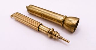 9ct Gold cigar piercer marked S.M, with a 9ct gold propelling pencil, 23g
