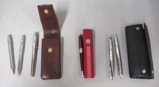 Cross three piece fountain pen, ballpoint pen and pencil set in a tan leather case, together with