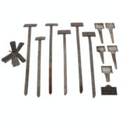 A GROUP OF EDWARDIAN CAST AND GALVANISED METAL BOTANICAL LABELS/PLANT MARKERS.
