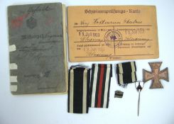 Kleines Lot Militaria, dabei 1 Militärpaß 1. WK, EK Bänder, 1 Nadel etc.