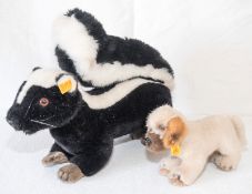 Steiff "Stinktier", Länge: ca. 37 cm, Höhe: ca. 30 cm, KF. Dazu Hund, Länge: ca. 23 cm, Höhe: ca. 14