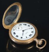 An unmarked yellow metal cased open faced fob watch, Elgin, USA, the black and white Roman numeral