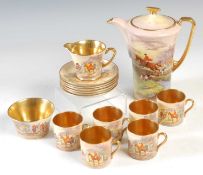 A Crown Devon ceramic coffee set, hand painted with hunting scenes, with gilt edges and interior, to