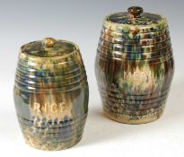 A large 19th century Scottish Pottery 'MEAL' jar with cover, mottled brown, blue, green and cream,