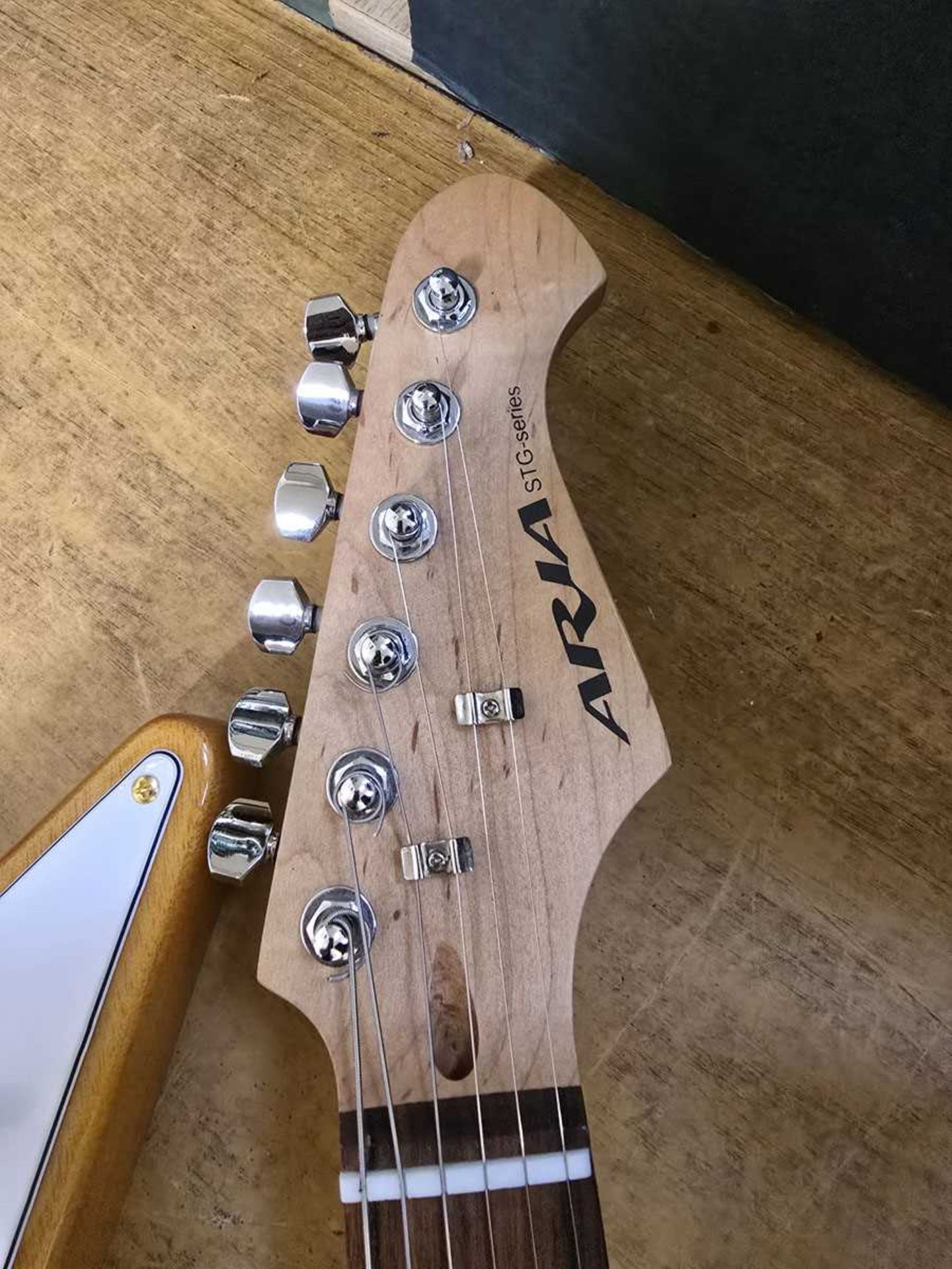 +VAT An Aria STG-Series electric guitar in natural wood finish - Image 2 of 2