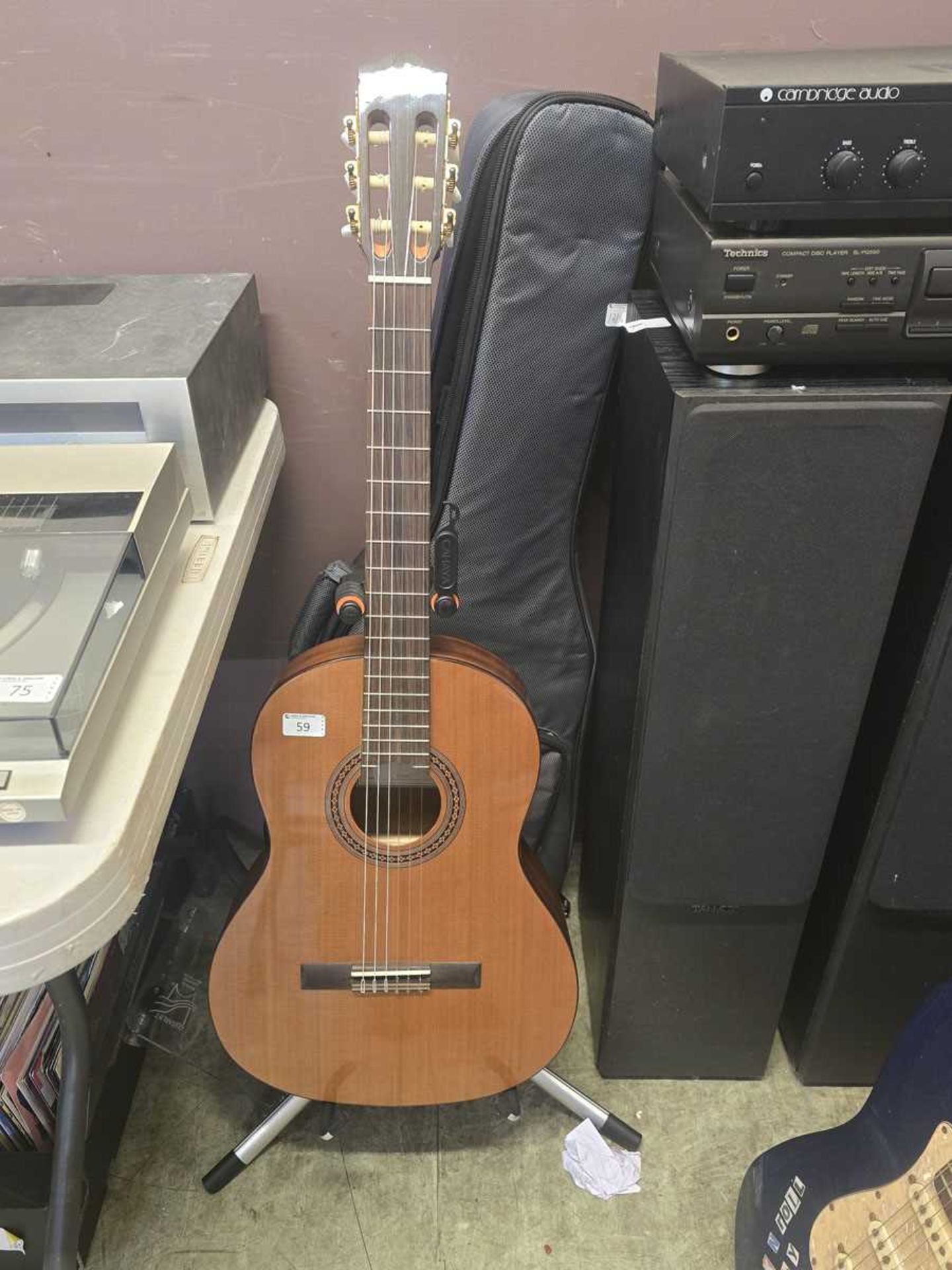 A Cordoba Iberia Series Model Dolce acoustic guitar with stand, rest, knee rest and bag