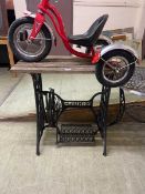 A Singer treadle machine base converted to table