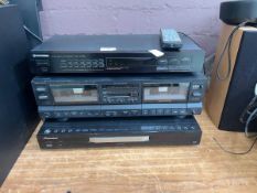 A Pioneer digital synthesizer tuner, along with Pioneer DVD player and a Genexxa stereo cassette
