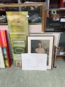 An assortment of artworks to include sketchbook, photographic print of young girl, modern wall