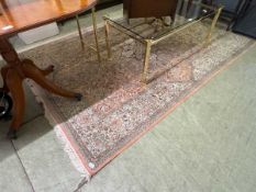 A pink ground eastern style rug