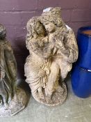 A composite garden statue of Romeo & Juliet