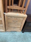 A modern oak bedside chest of two drawers by Oak Furnitureland