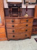 A late Victorian mahogany bow front chest of two short over three long drawers on bracket feet