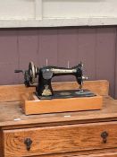 A Singer manual sewing machine (no lid)