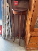 A Victorian mahogany jardinière stand with under tier