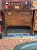 A mid-20th century oak chest of two drawers
