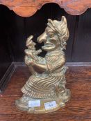 A brass Punch & Judy door stop