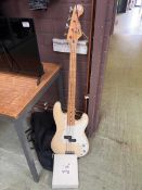 Squier by Fender four string bass guitar with bag (A/F) Frets have been removed and not been re-