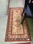 Terracotta ground rug