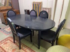 Black ash oval dining table with five chairs
