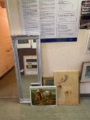 A modern mirror together with three artworks