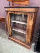 An Edwardian mahogany and strung pier cabinet with glazed door concealing shelving No apparent