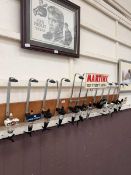 A Martini branded pub speed pour bar optics stand with taps for various spirits