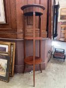 A late Victorian mahogany and strung three tier jardiniere stand