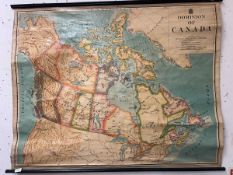 A 20th century wall map by W & A K Johnston Ltd. depicting the dominion of Canada