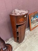 A late Victorian bow fronted wall mounted corner cabinet