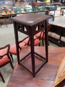 A 20th Century oak jardinière stand.