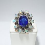 A TANZANITE, OPAL AND DIAMOND COCKTAIL RING.