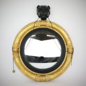 REGENCY CONVEX WALL MIRROR.