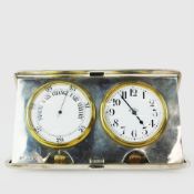 A J.C VICKERY TRAVEL CLOCK/ BAROMETER IN SILVER CASE.