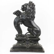 CAST IRON LION DOOR STOP.