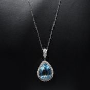 A PLATINUM AQUAMARINE AND DIAMOND PENDANT NECKLACE.