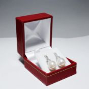 A PAIR OF 18CT GOLD PEARL AND DIAMOND EARRINGS.