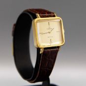 A RARE GOLD OMEGA DE VILLE 