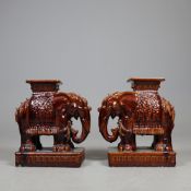 A PAIR OF ELEPHANT GARDEN STOOLS.