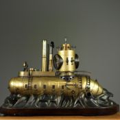 SUBMARINE FORM MANTEL CLOCK.