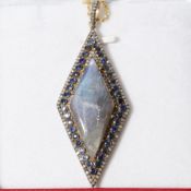 A LABRADORITE, SAPPHIRE AND DIAMOND PENDANT NECKLACE.