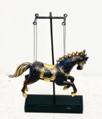 BRONZE MODEL OF A HORSE ON STAND.