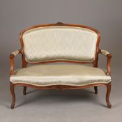 A LOUIS XV STYLE WALNUT CANAPE.