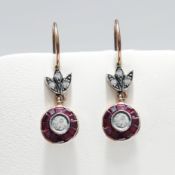 A PAIR OF 8CT ROSE GOLD RUBY AND DIAMOND DROP EARRINGS.