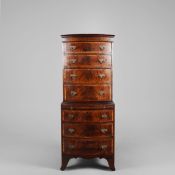 GEORGIAN STYLE BOWFRONT CHEST ON CHEST.