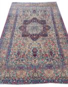 ANTIQUE PERSIAN KERMAN LAVER RUG.