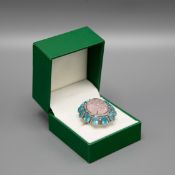 A WHITE METAL MORGANITE, APATITE AND DIAMOND DRESS RING.