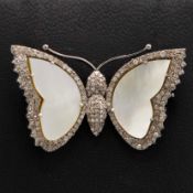A MOTHER-OF-PEARL AND DIAMOND SET BUTTERFLY BROOCH.