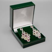 A PAIR OF TOURMALINE AND DIAMOND DROP EARRINGS.
